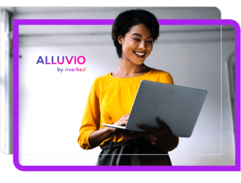 woman yellow blouse standing up with laptop