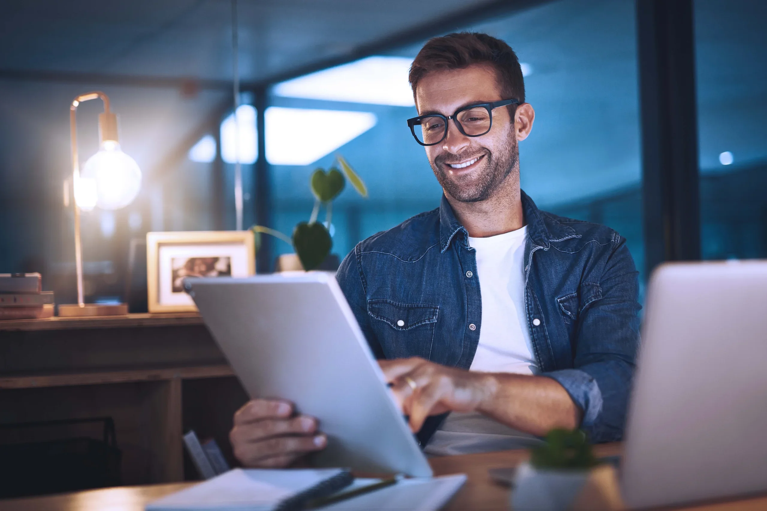 A man happily reviewing the project